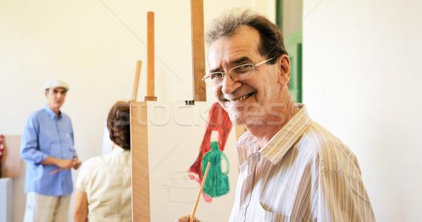 Old Man Painting Happy Senior People At Art School Stock photo © diego_cervo