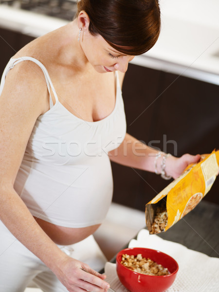Zdjęcia stock: Kobieta · w · ciąży · śniadanie · domu · włoski · miesiąc · jedzenie