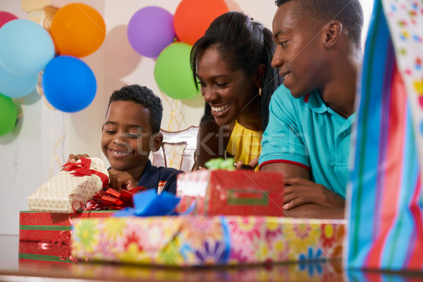 Birthday Party At Home With Black Mom Dad Son Celebrating Stock photo © diego_cervo