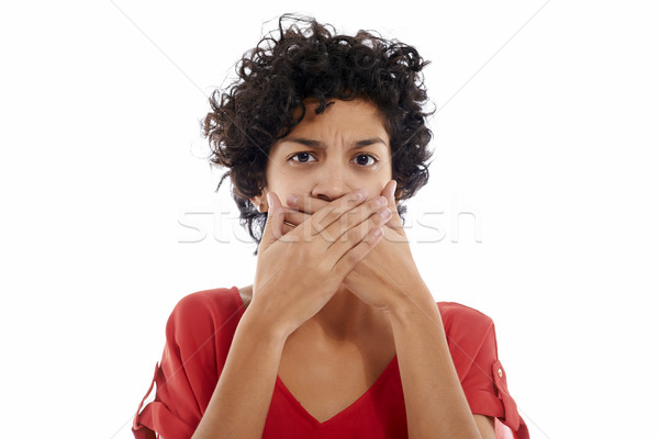 Stock photo: sad hispanic woman with hands on mouth