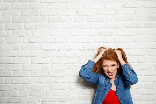 Arckifejezések fiatal vörös hajú nő nő közelkép portré Stock fotó © diego_cervo