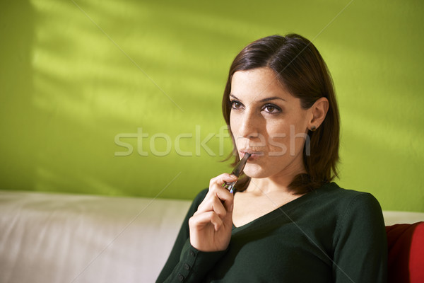 Fiatal nő dohányzás elektronikus cigaretta otthon fiatal Stock fotó © diego_cervo