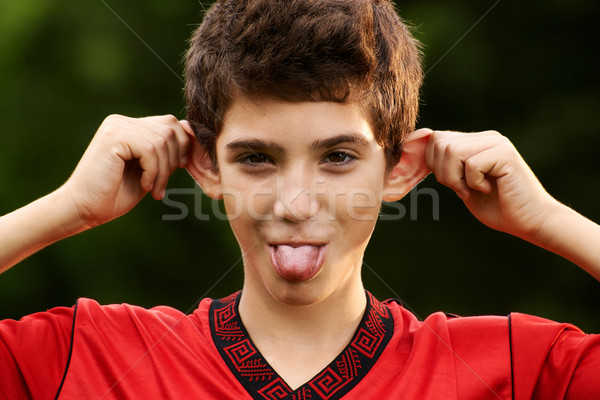 Fericit Hispanic băiat grimasa aparat foto Imagine de stoc © diego_cervo
