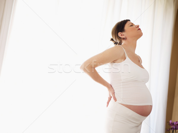 Stock fotó: Terhes · nő · hátfájás · olasz · hónapok · üzenetküldés · hát