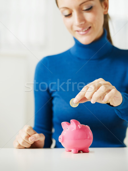 Stockfoto: Spaargeld · vrouw · euro · klein · spaarvarken · selectieve · aandacht