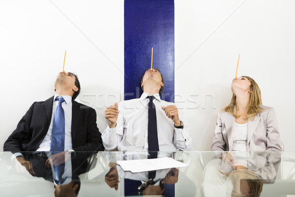 Iroda üzletemberek egyensúlyoz ceruzák arc tárgyalóterem Stock fotó © diego_cervo