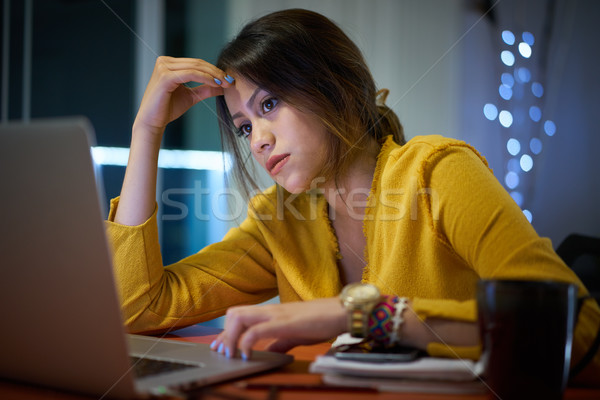 Pensive fille étudier nuit jeune femme [[stock_photo]] © diego_cervo