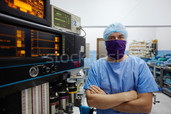 Portrait of surgeon looking at camera in clinic operation room Stock photo © diego_cervo