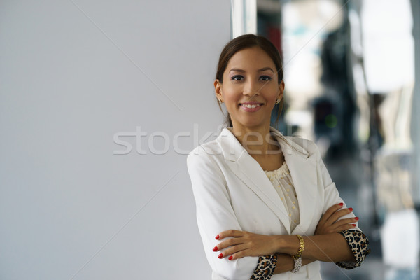Portrait of young happy hispanic business woman Stock photo © diego_cervo