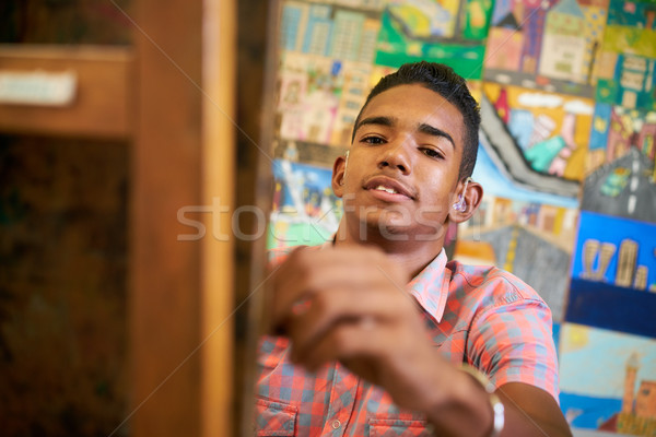 Happy Black Boy Student Of Art School Smiling At Camera Stock photo © diego_cervo