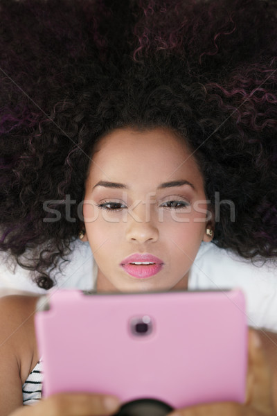 Koyu esmer kız dijital tablet okul ödev Stok fotoğraf © diego_cervo