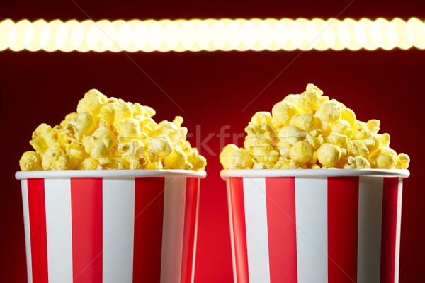 Bowls Filled With Popcorn For Movie Night Red Background Stock photo © diego_cervo