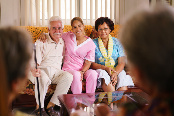 Portrait Of Nurse And Happy Old People In Hospice Stock photo © diego_cervo