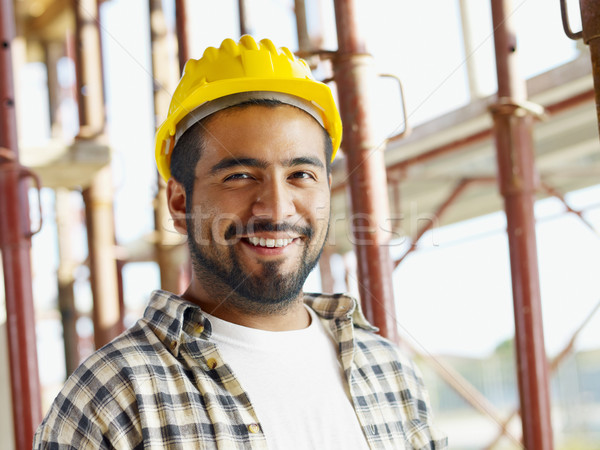 Trabajador de la construcción retrato americano mirando cámara hombre Foto stock © diego_cervo