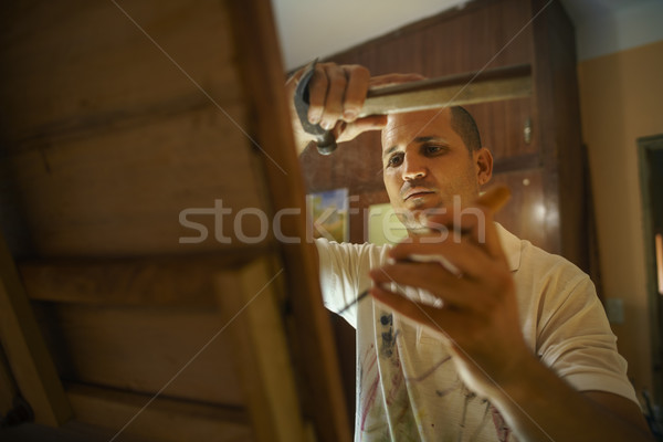 Sculptor Painter Artist Chiseling A Wooden Bas Relief-3 Stock photo © diego_cervo