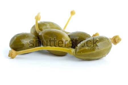 Some olives stuffed with pepper on a wooden toothpicks Stock photo © digitalr