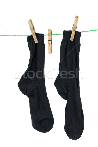 Two black socks hanging on rope Stock photo © digitalr