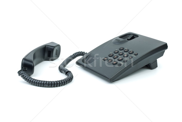 Stock photo: Black office phone with handset near