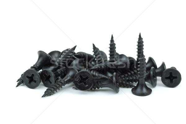 Close-up shot of  black metal screws pile Stock photo © digitalr
