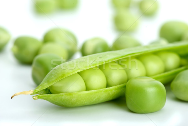 Macro shot of cracked pod and green peas Stock photo © digitalr
