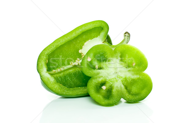 Half of green sweet pepper and flower-shaped slice Stock photo © digitalr