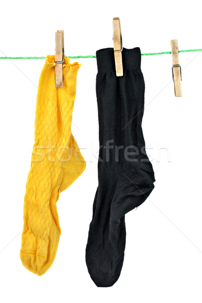 Yellow and black socks hanging on rope Stock photo © digitalr