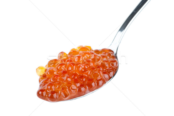 Small metal spoon filled with red salmon caviar Stock photo © digitalr