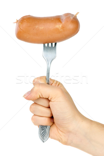 Hand holding sausage on fork. Isolated on the white background Stock photo © digitalr