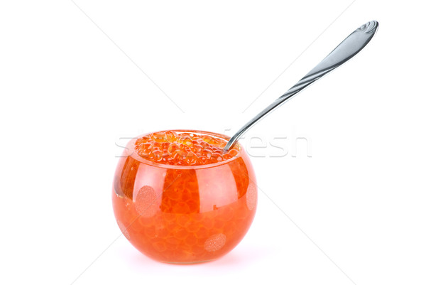 Glass bowl filled with red salmon caviar and small metal spoon Stock photo © digitalr