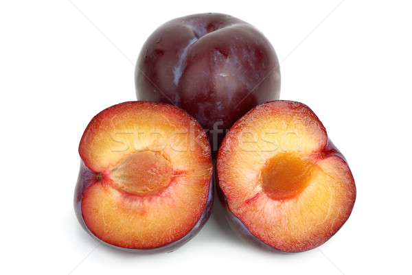 Violet plums: whole and two halves Stock photo © digitalr