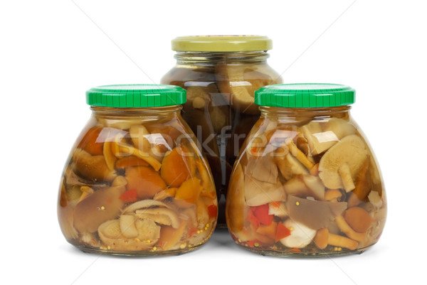 Glass jars with marinated mushrooms Stock photo © digitalr