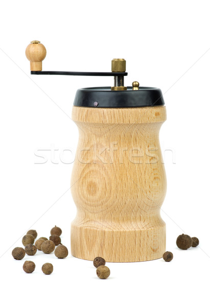 Stock photo: Wooden spice handmill and allspice 