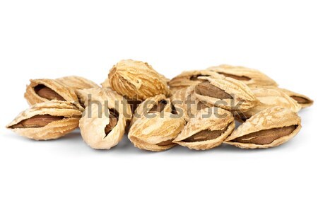 Few roasted cracked uzbek almonds Stock photo © digitalr