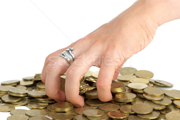 Hand grabbing coins from the pile Stock photo © digitalr