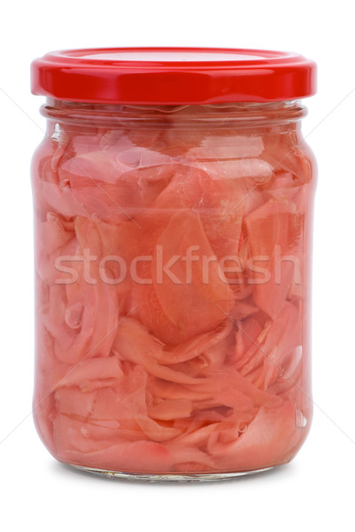 Stock photo: Sliced ginger root marinated in the glass jar