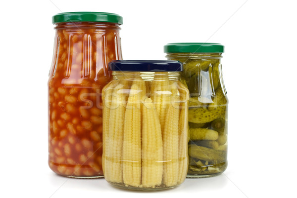 Glas jars with cornichons, haricot beans and corn ears Stock photo © digitalr