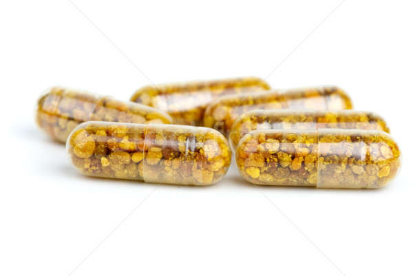 Homeopáticos pílulas abelha pólen isolado branco Foto stock © digitalr
