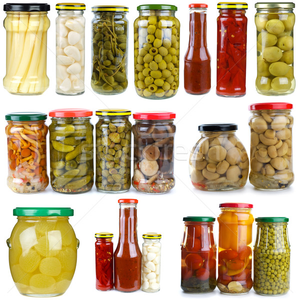 Set of different berries, mushrooms and vegetables conserved in glass jars Stock photo © digitalr