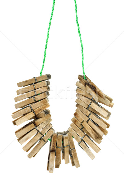 Few wooden clotespins hanging on the rope Stock photo © digitalr