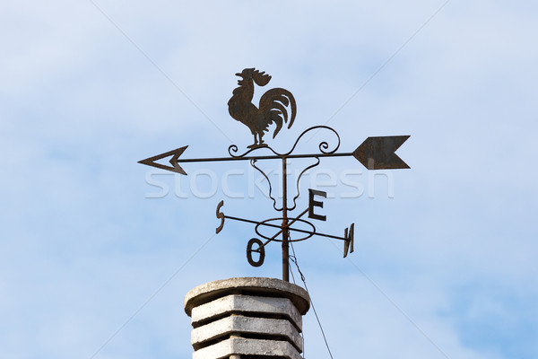 Weathercock on the chimney Stock photo © digoarpi