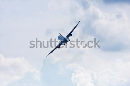 Vliegtuig bewolkt hemel luchthaven snelheid wolk Stockfoto © digoarpi