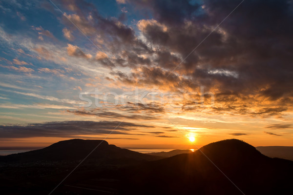 Puesta de sol paisaje lago Balaton Hungría montana Foto stock © digoarpi