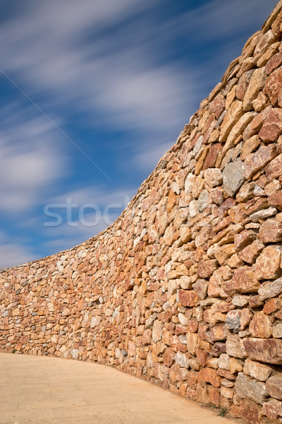 Long exposure effect in a long brick wall  Stock photo © digoarpi