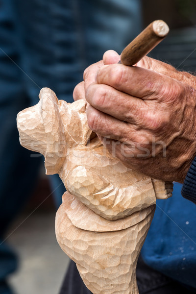 Stock photo: Skilful carver working 