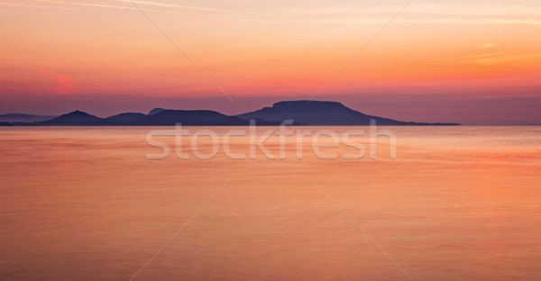 Sunrise over the lake Balaton of Hungary, long exposure Stock photo © digoarpi