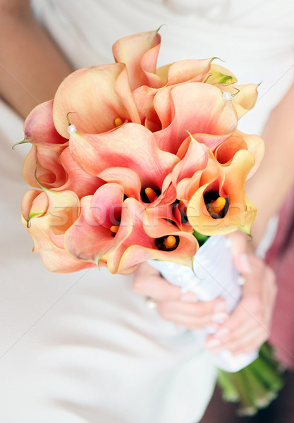 [[stock_photo]]: Bouquet · fleurs · orange · mains · jeune · femme