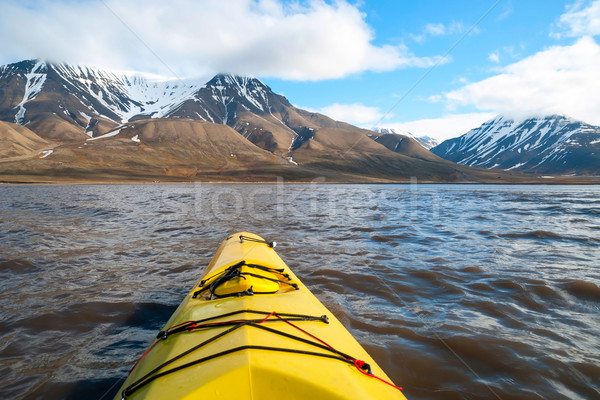 Kayaking on the sea in Svalbard, first person view Stock photo © dinozzaver