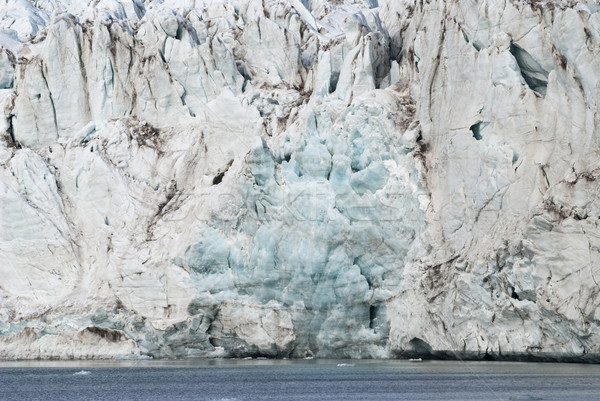 Close up of blue ice in the glacier by the sea, Svalbard Stock photo © dinozzaver