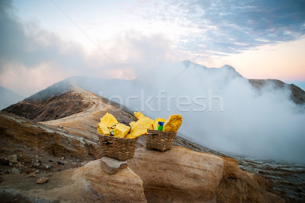 Baskets with sulphur at Kawah Ijen krater, Indonesia Stock photo © dinozzaver