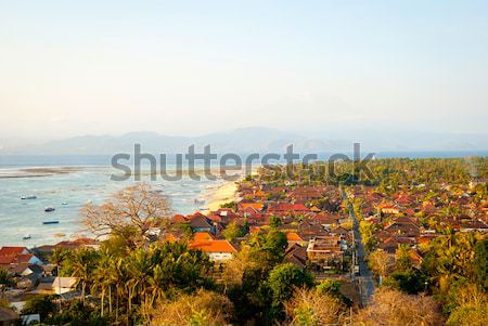 Kilátás falu Indonézia panorámakép sziget víz Stock fotó © dinozzaver